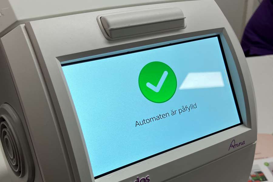 Maskin med texten Automaten är påfylld och en grön checkbox